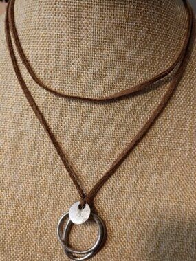 Xiomara Castro Brown Leather Necklace with Silver Pendant